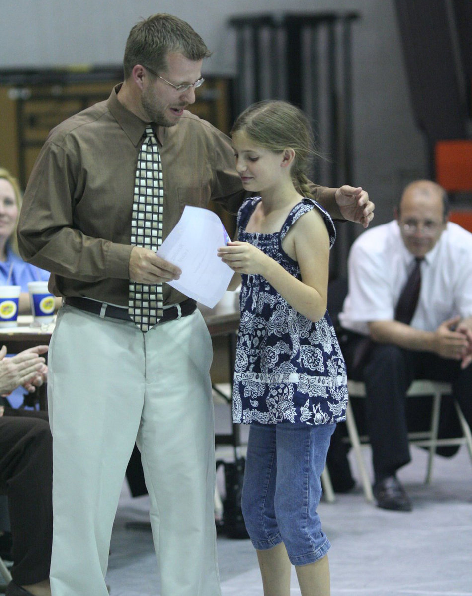 Image: Reading Award — Samantha Ragland gets Mr. Morgan’s 4th Grade Class Reading Award.