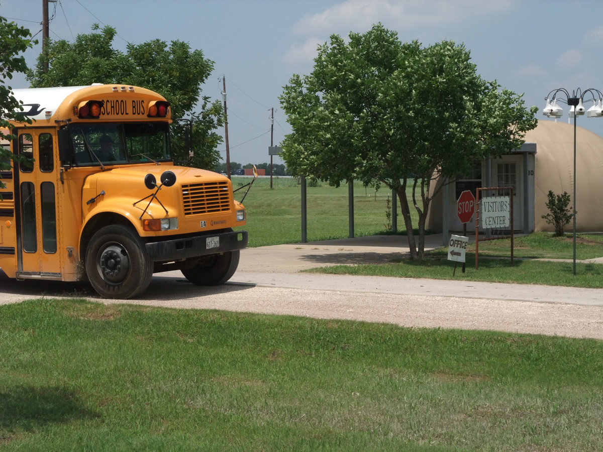 Image: Taking care of bus-iness — Stafford Tigers’ gifted and talented students hopped a school bus and visited the Monolithic campus to drop off a Thank You card on behalf of the kindergarten class.