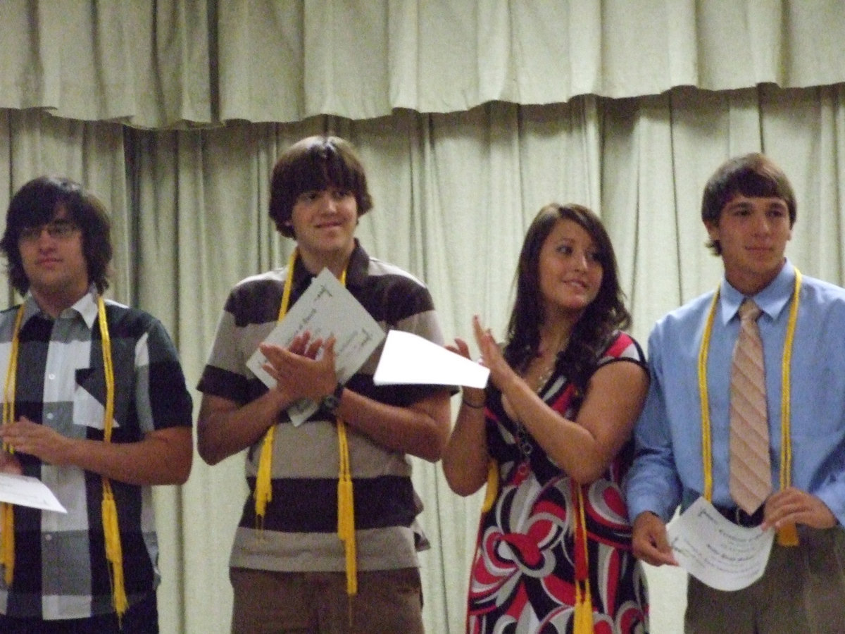 Image: Honored grads — Trevor Davis, Tyler Boyd, Angelica Garza, Clay Major, Chase Michael, Michael Vlk and Craig Wright are the honored students.