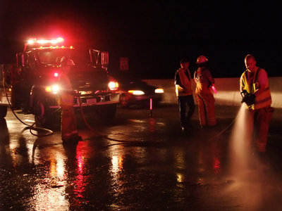Image: Clearing the scene — Italy Fire Crews use water to clear I35.