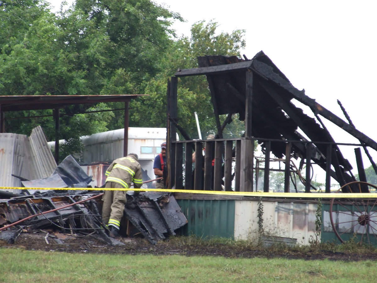 Image: Still Hard at Work — Milford fire fighters still on the scene.