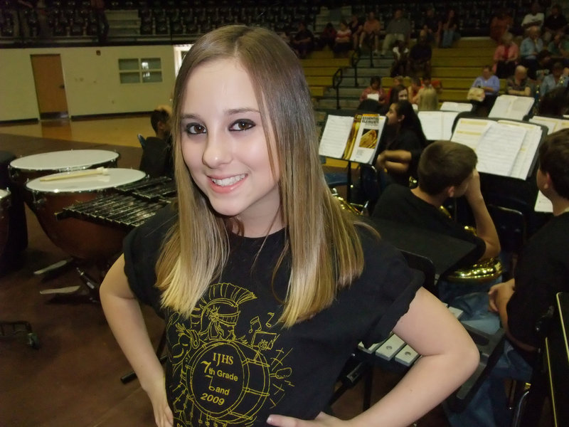 Image: Haylee Love-s making music with her band — Haylee Love received the 7th Grade Percussion Award.