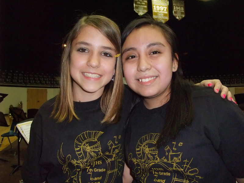 Image: Lauren &amp; Martha — The 7th graders are about to play while wearing their matching “Sounds Of Victory” spirit shirts.