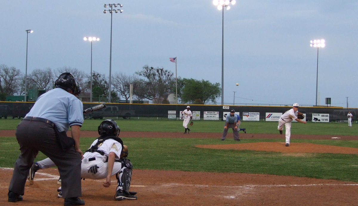 Image: Attaboy, Buck — Justin “Buck” Buchanan throws strikes against Whitney.  Caden Jacinto catches.