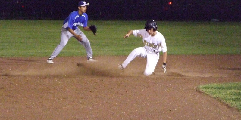 Image: Bringing home some dirt — Ross Stiles stole 2nd in the bottom of the 5th inning.