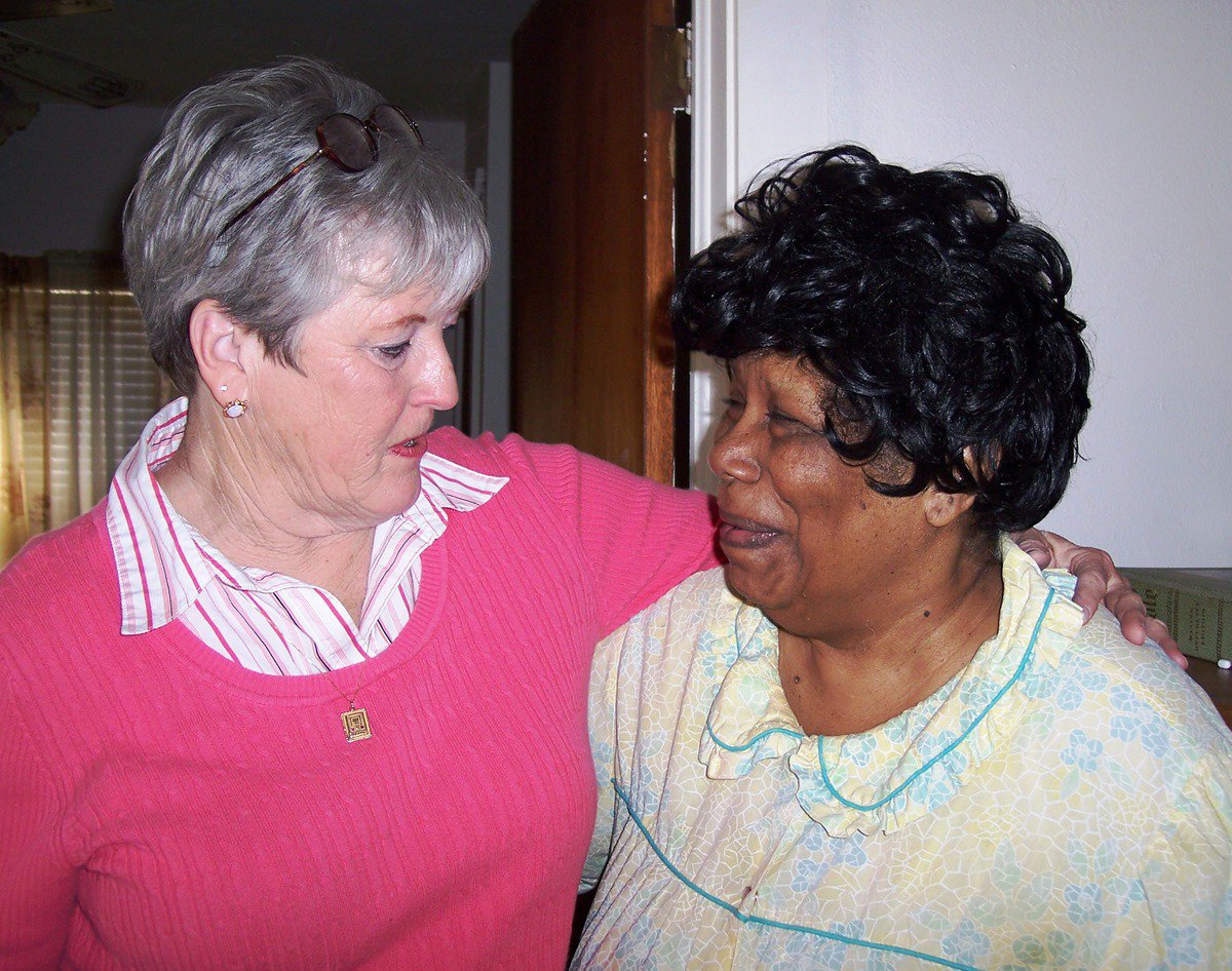 Image: Johnnie Robinson and Helen Jay — Volunteers are the “eyes and ears” of Meals-on-Wheels, checking on the homebound elderly.