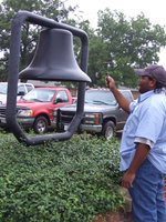 Image: Walker rings the bell — Shedric Walker (Munchie) rings the bell 5 times in three sequences.