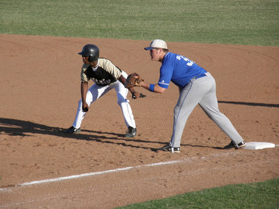Image: Jasenio leads — In his 1st year with the IHS Baseball Team, #10 Jasenio Anderson helped lead the Gladiators all the way to Area. And true to form, Jasenio gets a lead at 1st base.