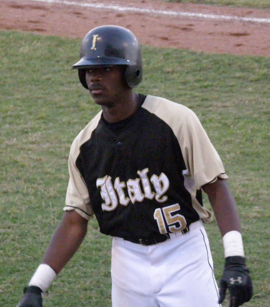 Image: Desmond warms up — #15 Desmond Anderson gets warmed up in the batter’s circle.