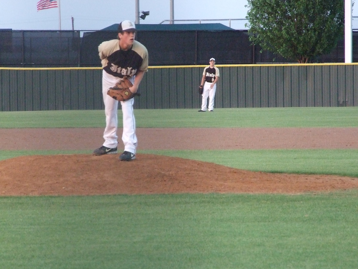 Image: Buck pitches — Freshman, Justin Buchanan, begins the play off game against Perrin-Whitt.