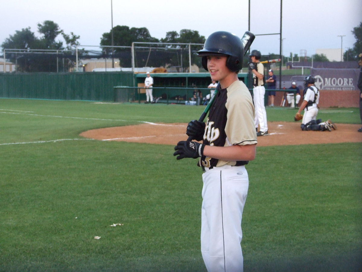 Image: Buck waits his turn — Justin warms up in the batter’s box.