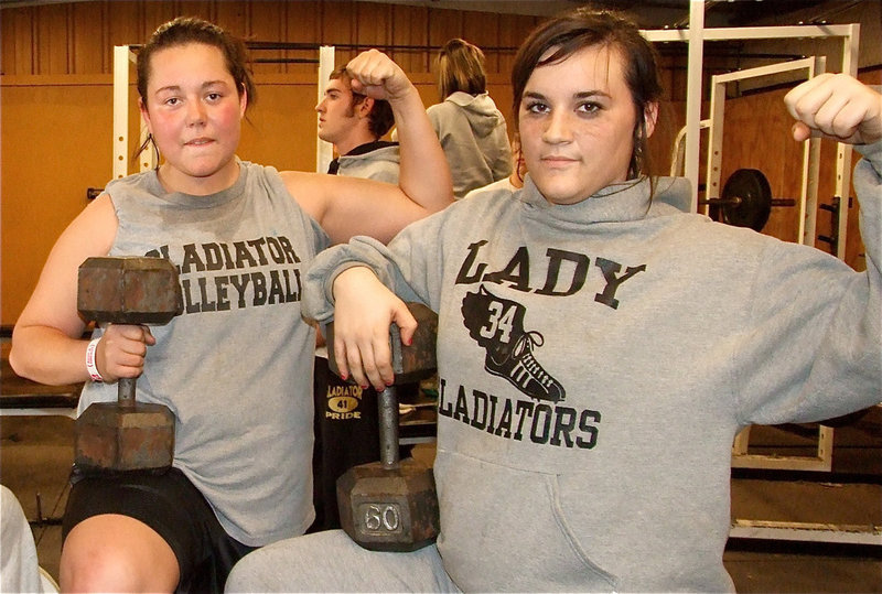 Image: Two of Italy’s strongest — Lady Gladiators Nikki Brashear and Kaytlyn Bales during powerlifting workouts earlier in the season. Both girls recently qualified for regionals with Bales earning a 4th Place medal and a return trip to the state powerlifting meet in Corpus Christi.