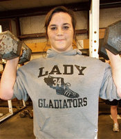 Image: Bales works out — Kaytlyn Bales does a light workout before picking up the big weights.