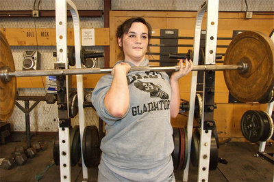 Image: Bar none — Kaitlyn Bales handles these 45s like a baton.