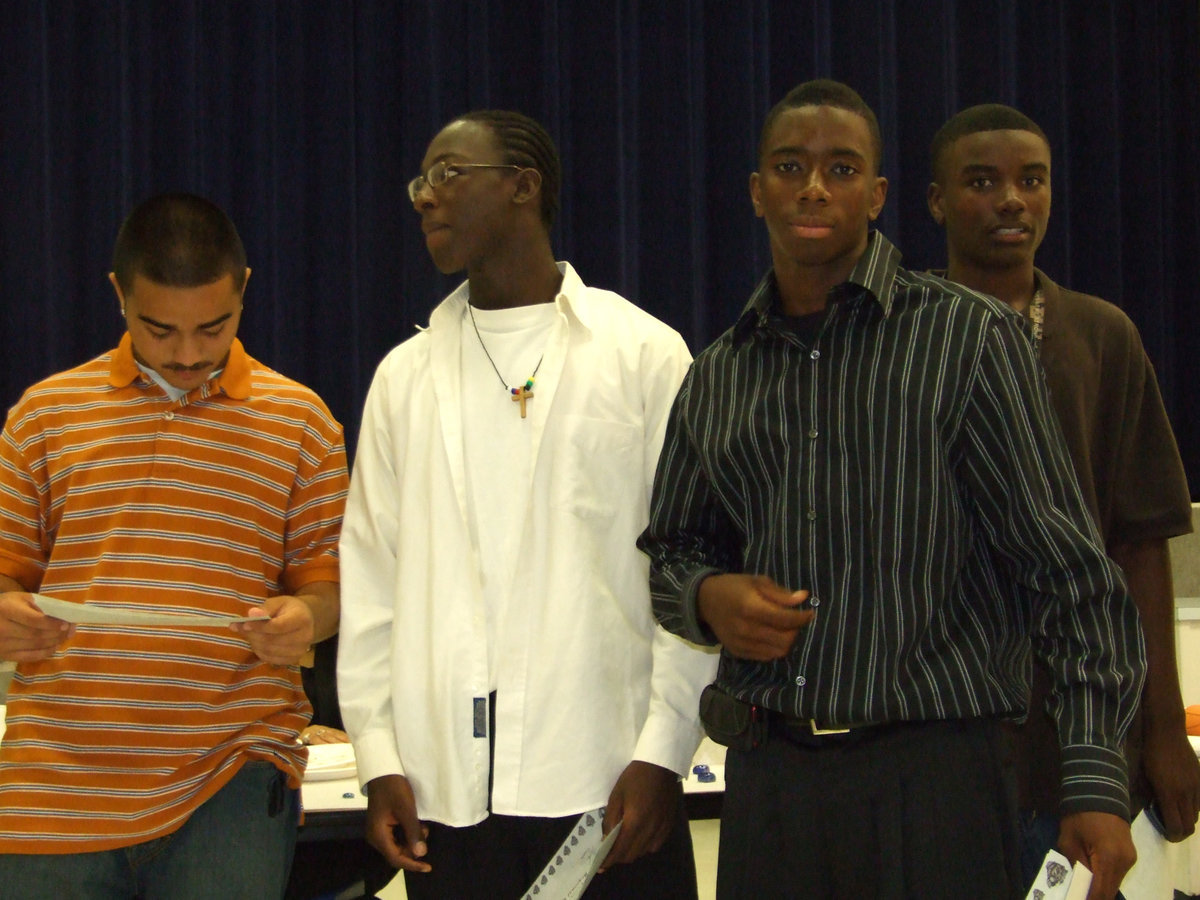 Image: Moment to shine — Enjoying the moment are Rolando Vega, Lee Smith, Jamar Davis and A.D. Hightower.