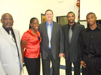 Image: Ross and Williamson — During the Milford Athletic Banquet 2008-2009, Ashley Ross and Derek Williamson were selected as Milford’s Top Bulldogs and stand with their coaches after the banquet. Left to Right: Coach Otis Carter, Ashley Ross (Milford Bulldogs Female Athlete Of The Year), Coach Ronny Crumpton, Coach Larry Williamson and Derek Williamson (Milford Bulldogs Male Athlete Of The Year).