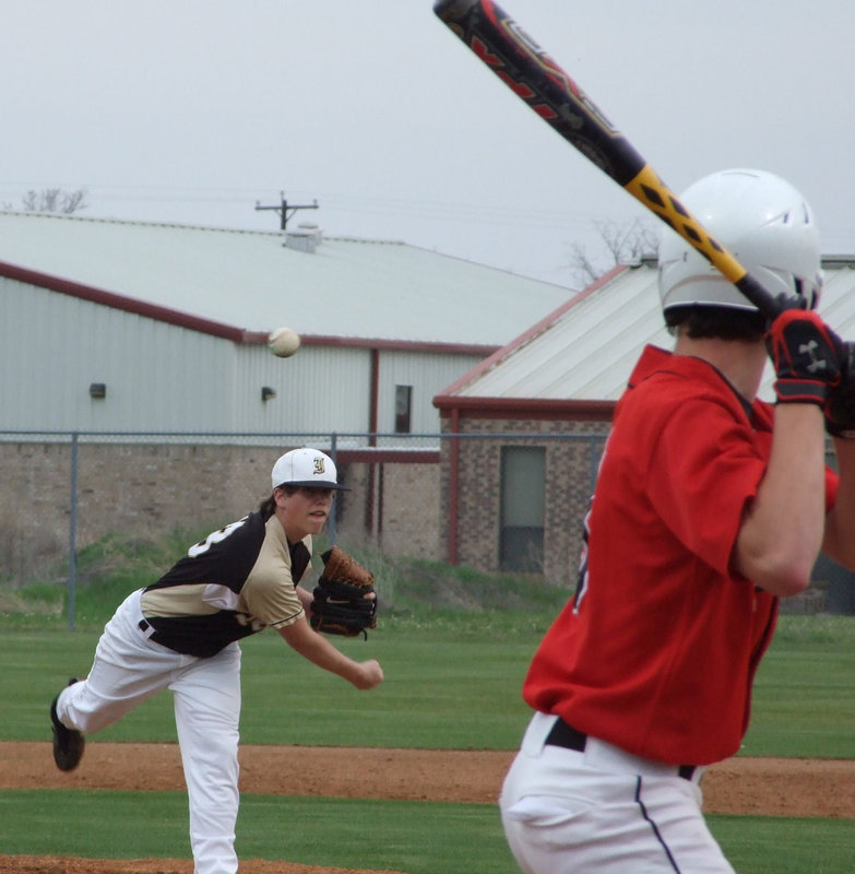 Image: Here comes Buck — Pitcher Justin Buchanan pitches the game against the Axtell Longhorns in the Gladiator’s first district game of the season on Tuesday.