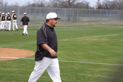 Image: Coach Bales — Coach Craig Bales steps around to the first base side.