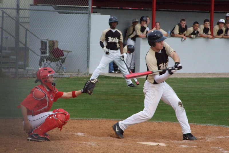 Image: Kyle at bat — Kyle Wilkins get a base hit.
