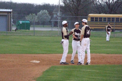 Image: Jasenio, Ross, Colten — Infield has a discussion.