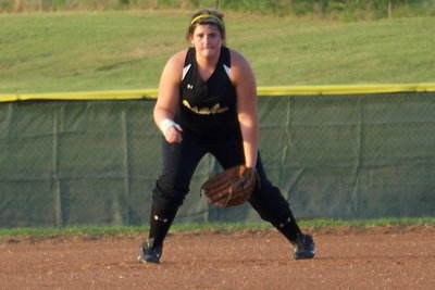 Image: “Mere Bear” — Meredith Brummett shows off her ready form at shortstop.