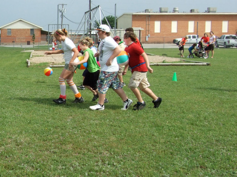 Image: Beach Ball Relay — Whoops! Someone dropped the ball!