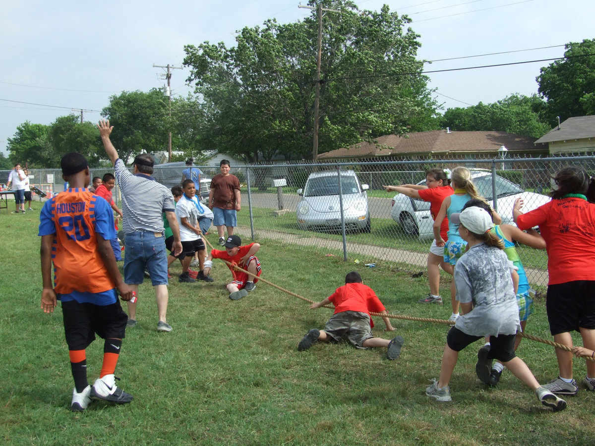 Image: Tug Of War — Students are dropping like flies!