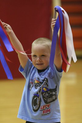 Image: Star And Stripes — Evan and his classmates’ singing wins them a 5th place ribbon!
