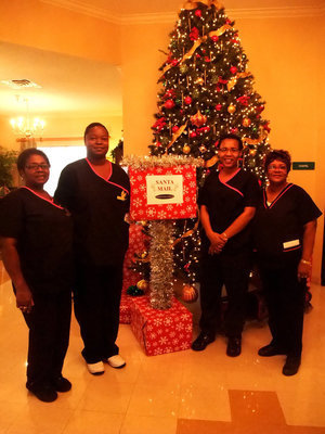 Image: House Keeping Staff — The House Keeping staff are ready for all of Santa’s letters.