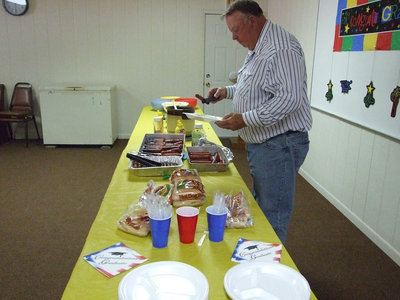 Image: Ron enjoys another hot dog — Parishioner Ron Scott enjoyed eating with the seniors on Wednesday.