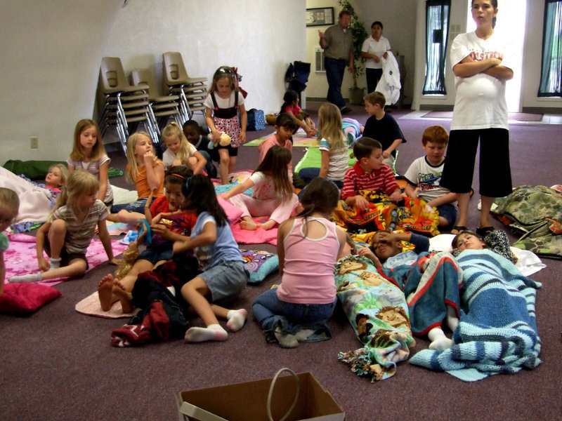 Image: Movie Time — Everyone is settling in to watch a video.