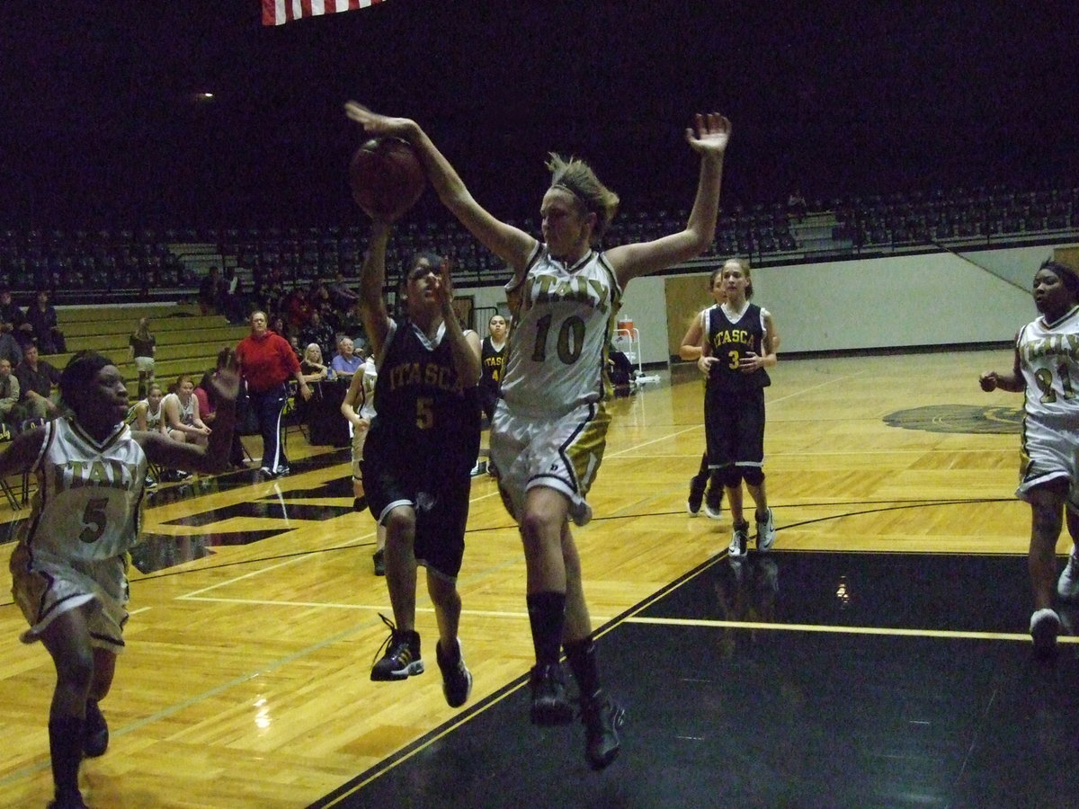 Image: Italy’s #10 Brianna Perry denies Itasca — The 8th grade girls have a deep desire to win and a big part of that is Italy’s #10 Brianna Perry as she blocks this shot attempt by Itasca to help preserve a 34-25 win for the Lady Gladiators.