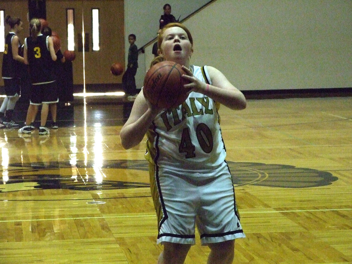 Image: Byers gets loose — Katie Byers #40 practices from the charity stripe during the pre-game warm up. Byers later earned 1-point from the line in the game against Itasca.