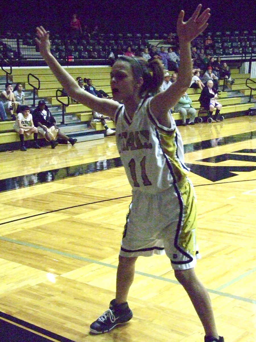 Image: Anna blocks view — Anna pressures the inbound pass from Itasca and forces the turnover as the pass deflects off the back of the backboard a setting up an Italy score.