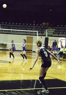 Image: Serve it hot — Sophomore Kaitlyn Rossa serves the Lady Chargers.