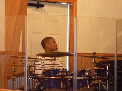 Image: Drum Player — This drummer could really play the drums.