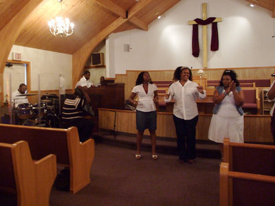 Image: Let’s Praise The Lord — The praise and worship was lead by members of the Joy Tabernacle Church.