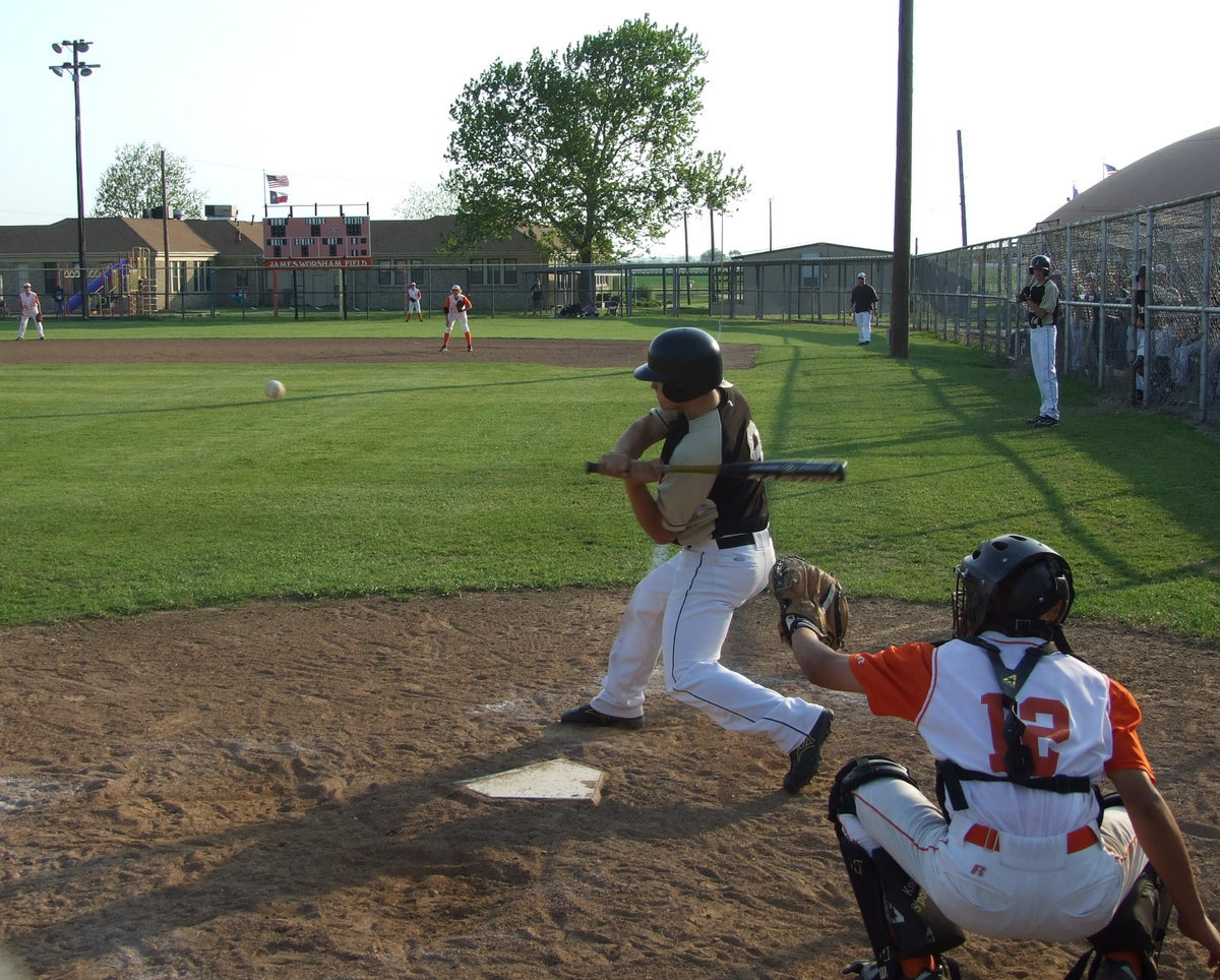 Image: Ethan Simon is up — Lefty Ethan Simon gives that ball a good cut!