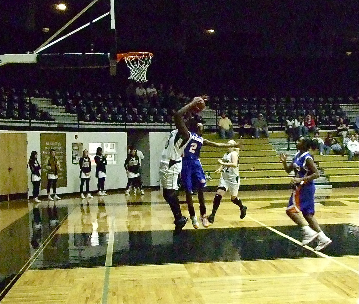 Image: Reed Rocks — Reed rocks the boards against Gateway.