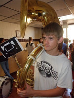 Image: Justin Wood and his tuba are on their way to practice marching — The Gladiator Regiment Band, 8th – 12th graders, has been putting in long hours and long notes this summer in getting ready to fuel Italy High School with a spirited beat.