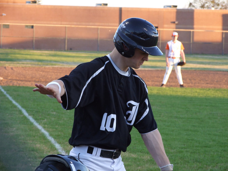 Image: Wait a minute — Chase Hamilton takes a minute before he bats.