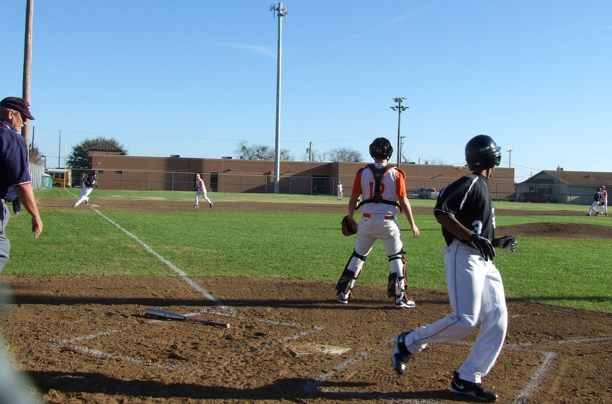 Image: Carson scores — Eric Carson comes in, followed by Reid and then Ross.  This was the bottom of the 2nd inning and 5 runs were made by the Italy Gladiators.