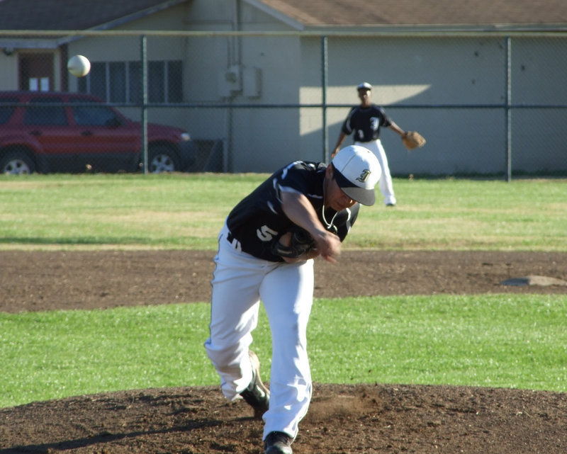 Image: All he’s got — Reid Jacinto pitches against the Avalon Eagles.