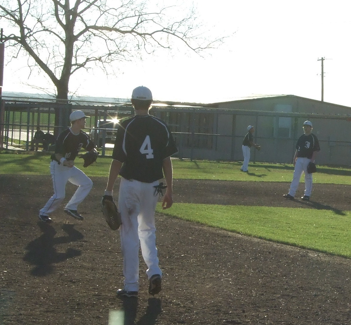 Image: Work out between innings — Chase plays catch with Zain Byers.