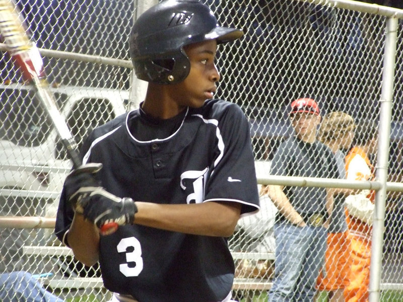 Image: Eric’s turn — Eric Carson takes his turn at the bat.