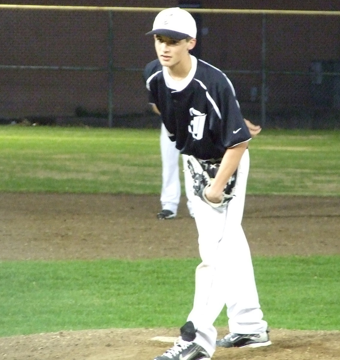 Image: Ross is up — In the last inning, Coach Ward changes pitchers and Ross Stiles came in.