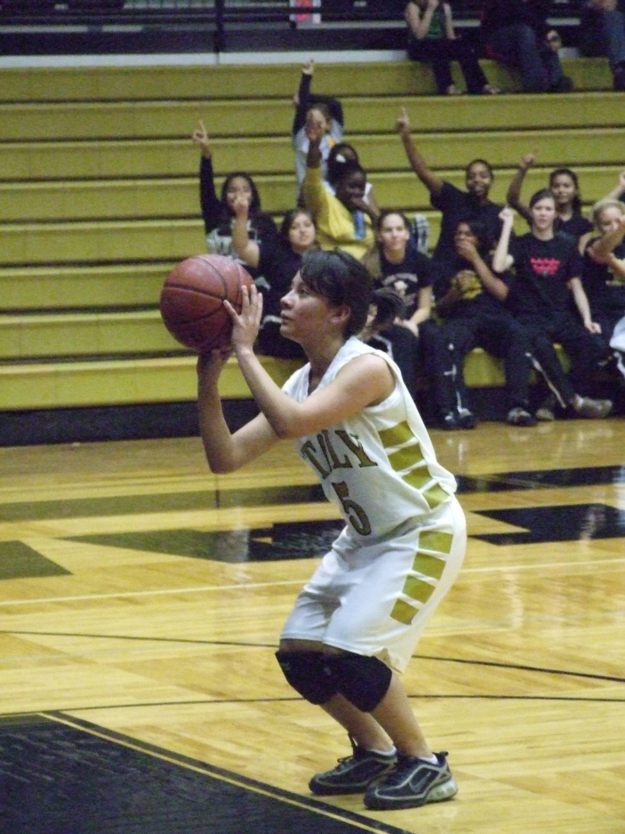 Image: Lupita Luna — With a little encouragement from the Italy Lady Gladiators Varsity squad members, Italy’s #5 Lupita Luna sinks a free throw against the Gateway Gators.