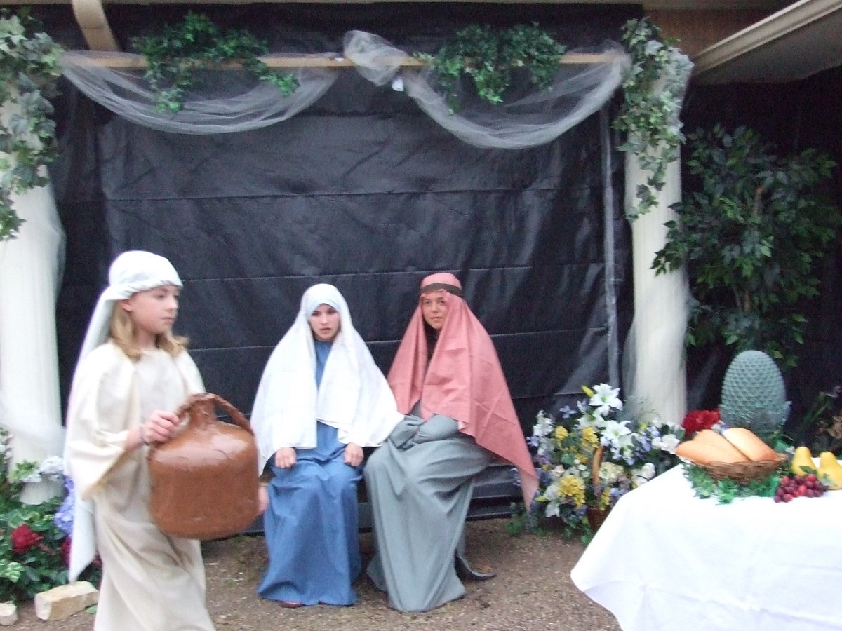 Image: Servant, Mary and Guest — The servant, Salome and guest are in the garden.