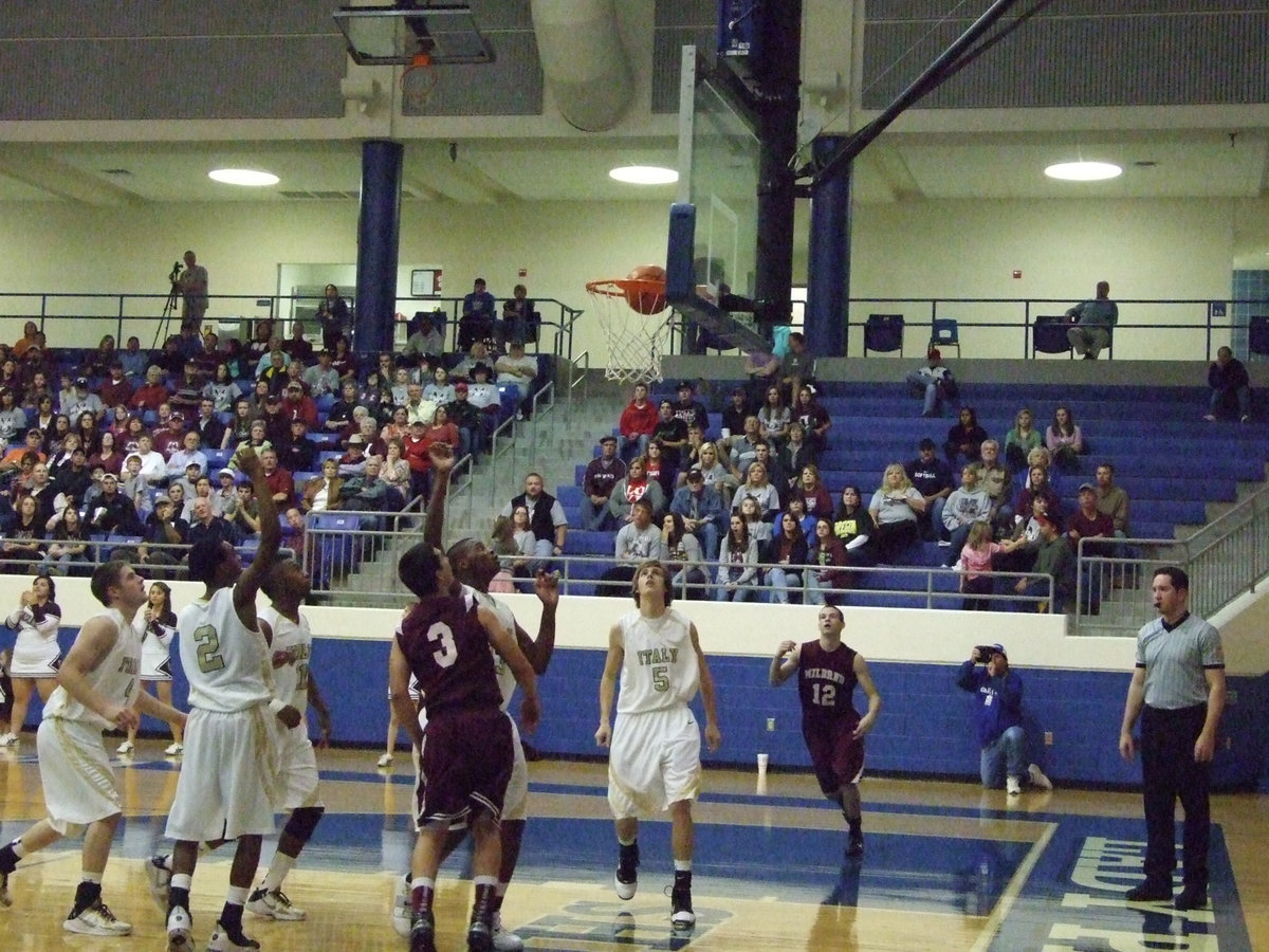 Image: Mayberry scores — Larry Mayberry(13) gets the follow shot to drop in.