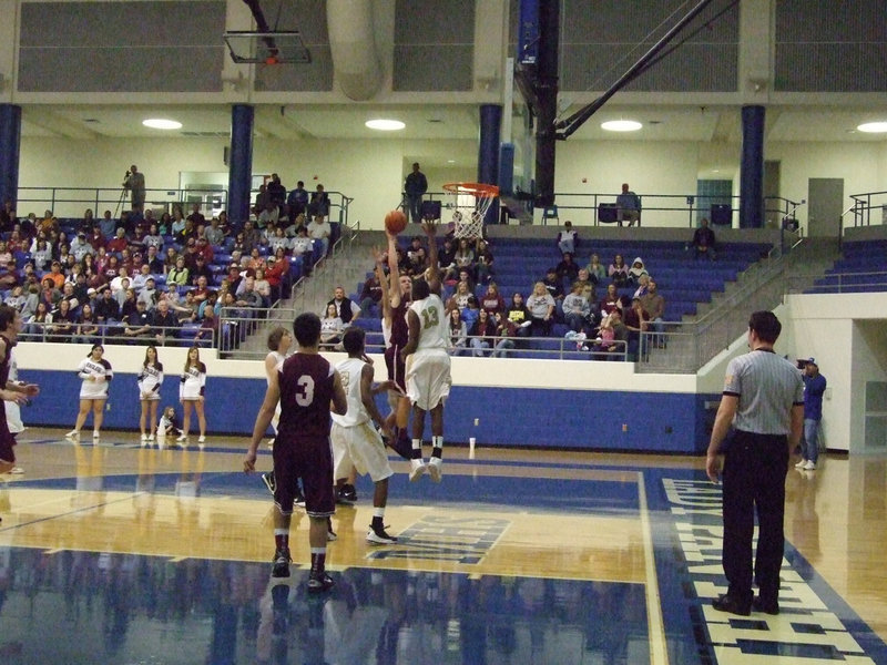 Image: Mayberry takes care of business — Junior Larry Mayberry(13) patrols the paint for the Gladiators.